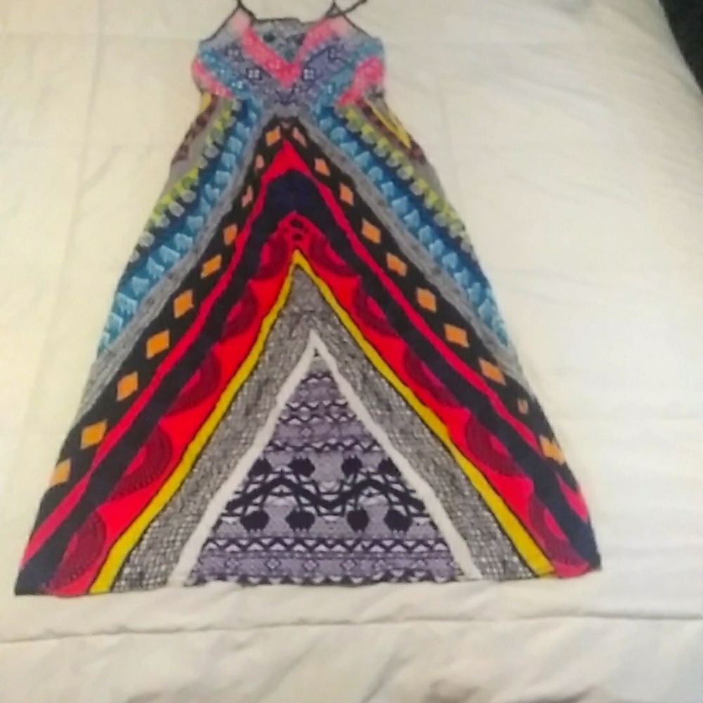 Dress colorful beautiful it fit to small and medium size
